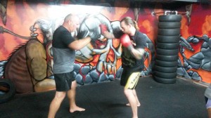 Greg holding pads for Mick, during Tues night boxing class!